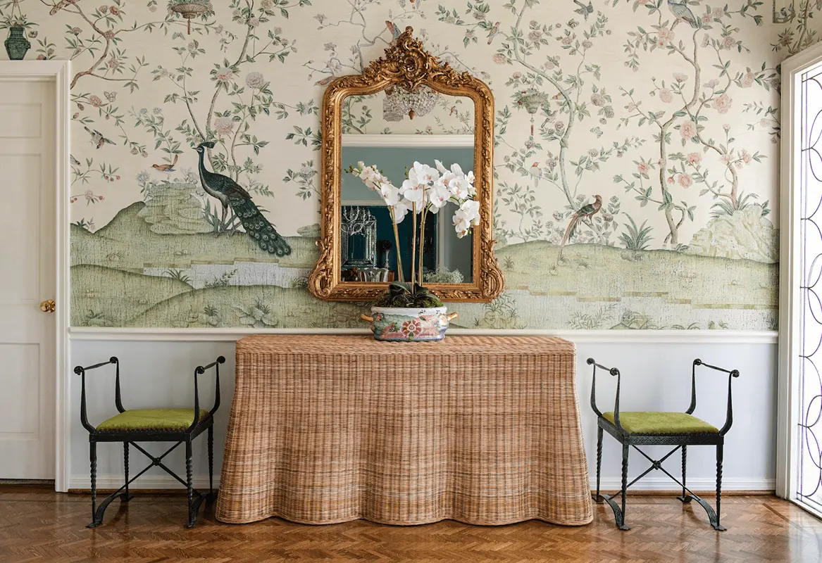 Wallpaper installer working in Imperial Beach with high-quality tools and materials, applying wallpaper with precision.